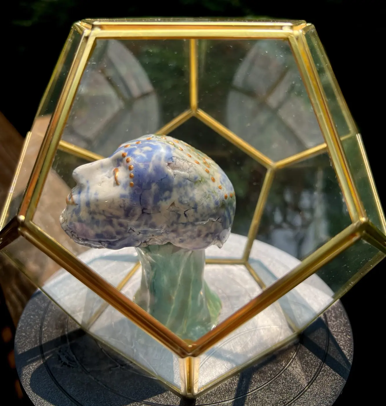 Inside a brass dodecahedron