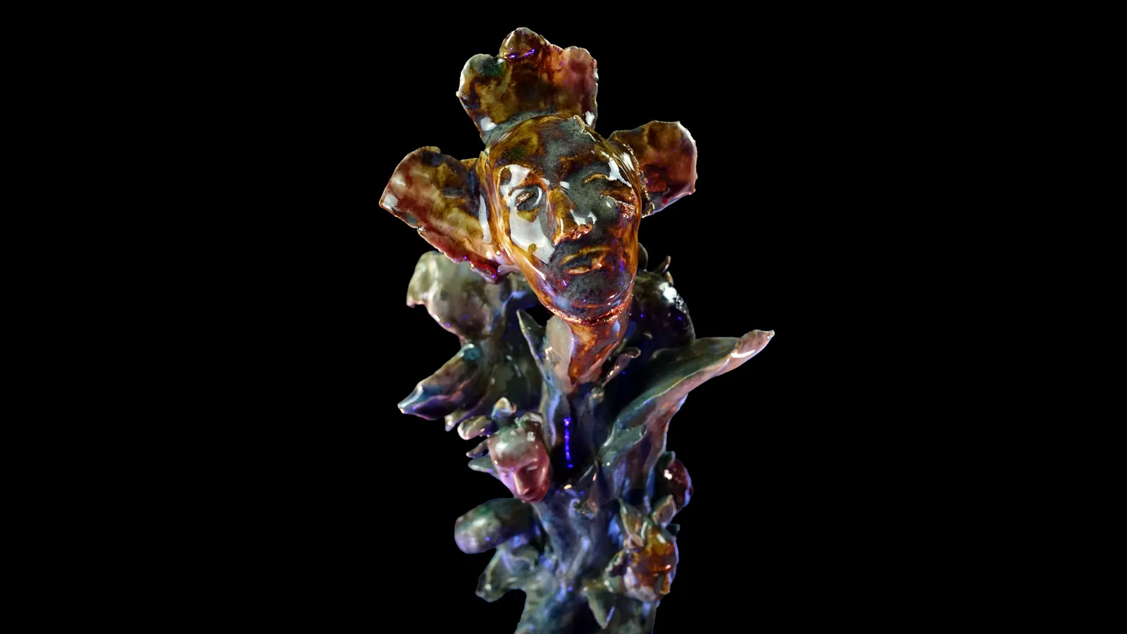 Verdelianus: a glazed ceramic Little Martian, its crown opening like petals, lit against black.