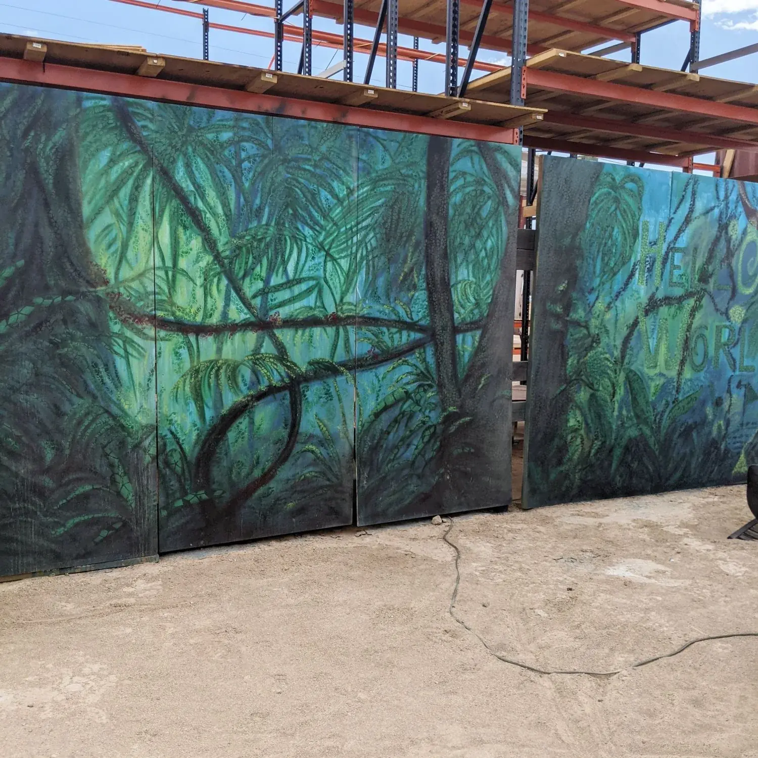2021. A jungle painted across the plywood.