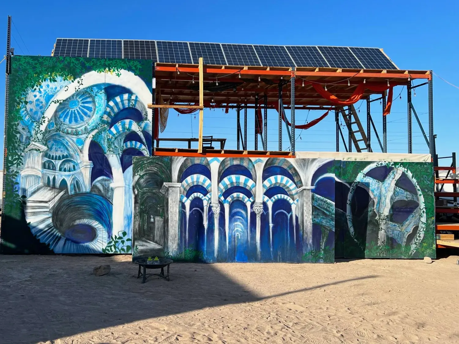 2022. Blue arches under the solar array.