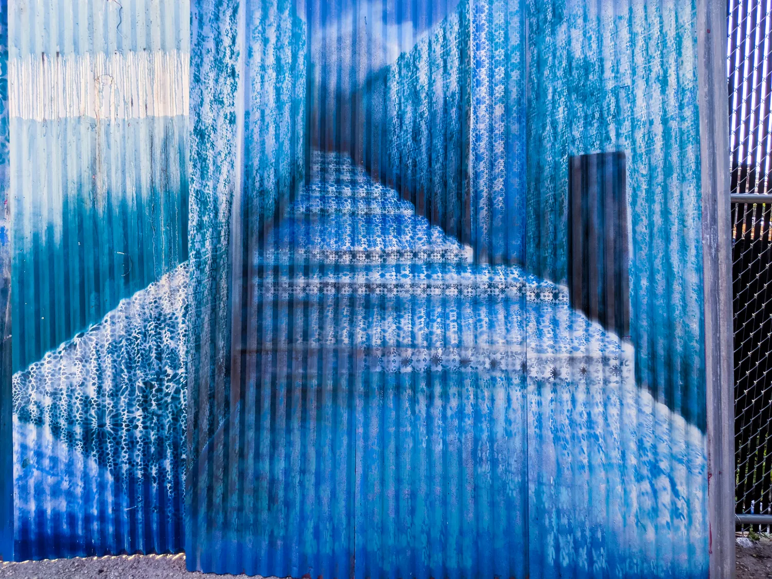 Four years of sun on the corrugated metal.