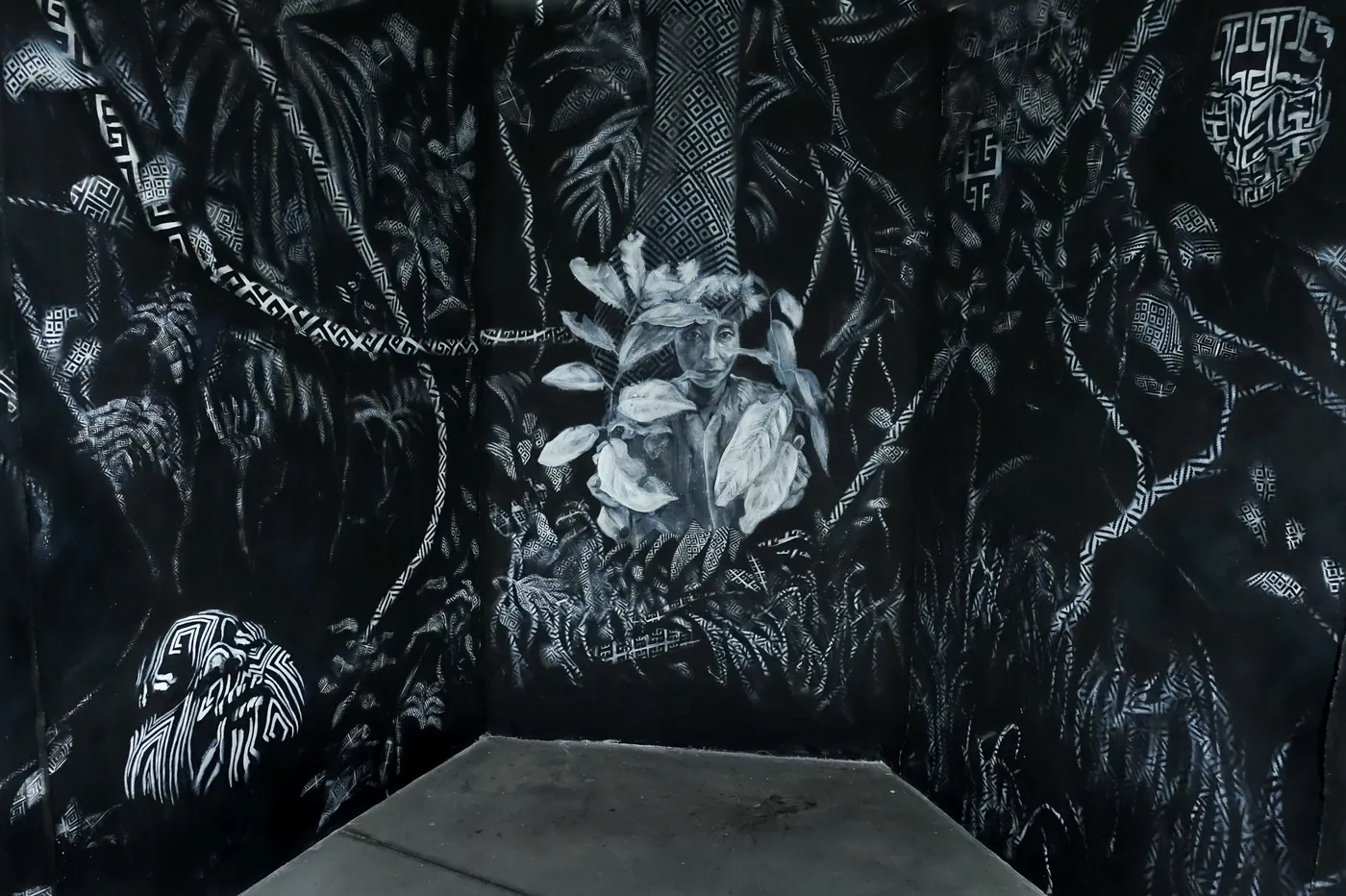 The Nhandepa immersive installation, painted patterns lit by projection mapping.