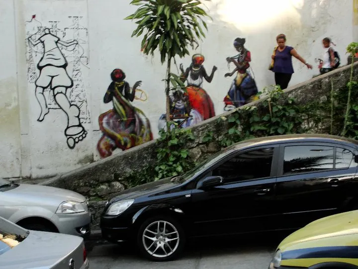 Rio, early work, painted between parked cars.